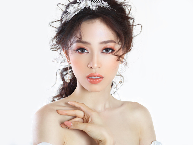 Á hậu Phương Nga hóa tân nương với makeup tông cam